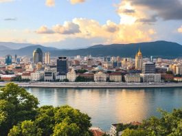 Skopje skyline with Vardar River and historical buildings.