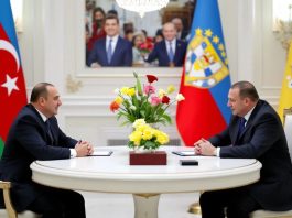 President Aliyev and Dodik meet at a round table.