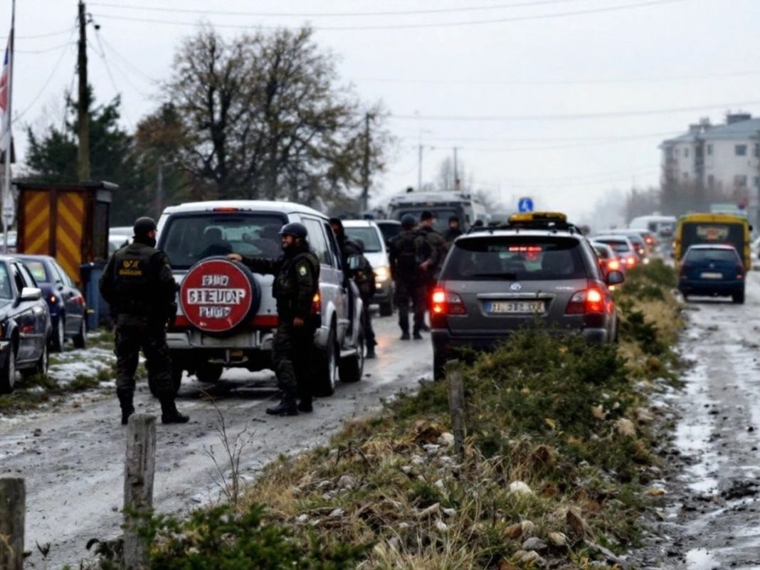 Roadblock in Kosovo with halted vehicles and police presence.