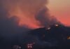 Smoke billows over Montenegro as wildfires rage.