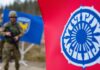 OSCE flag and Kosovo flag with soldiers in background.