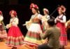 Bulgarian folk dancers and Chinese musicians perform together.