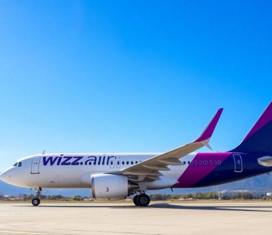 Wizz Air plane in Montenegro with mountains.