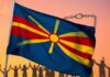 North Macedonia flag and diverse people celebrating human rights victory.